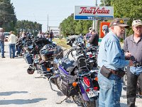 Later, at Wheeler's True Value, the motorcyclists lined up and exchanged stories : Bikes Galore, Hometown Warrenton, event